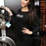 SEMA model at 2015 SEMA by W&HMsource: www.wheelsandheelsmag.com